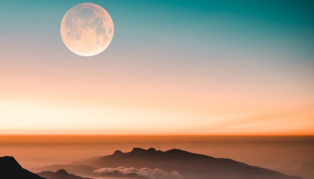 the moon at sunset