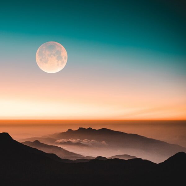 the moon at sunset